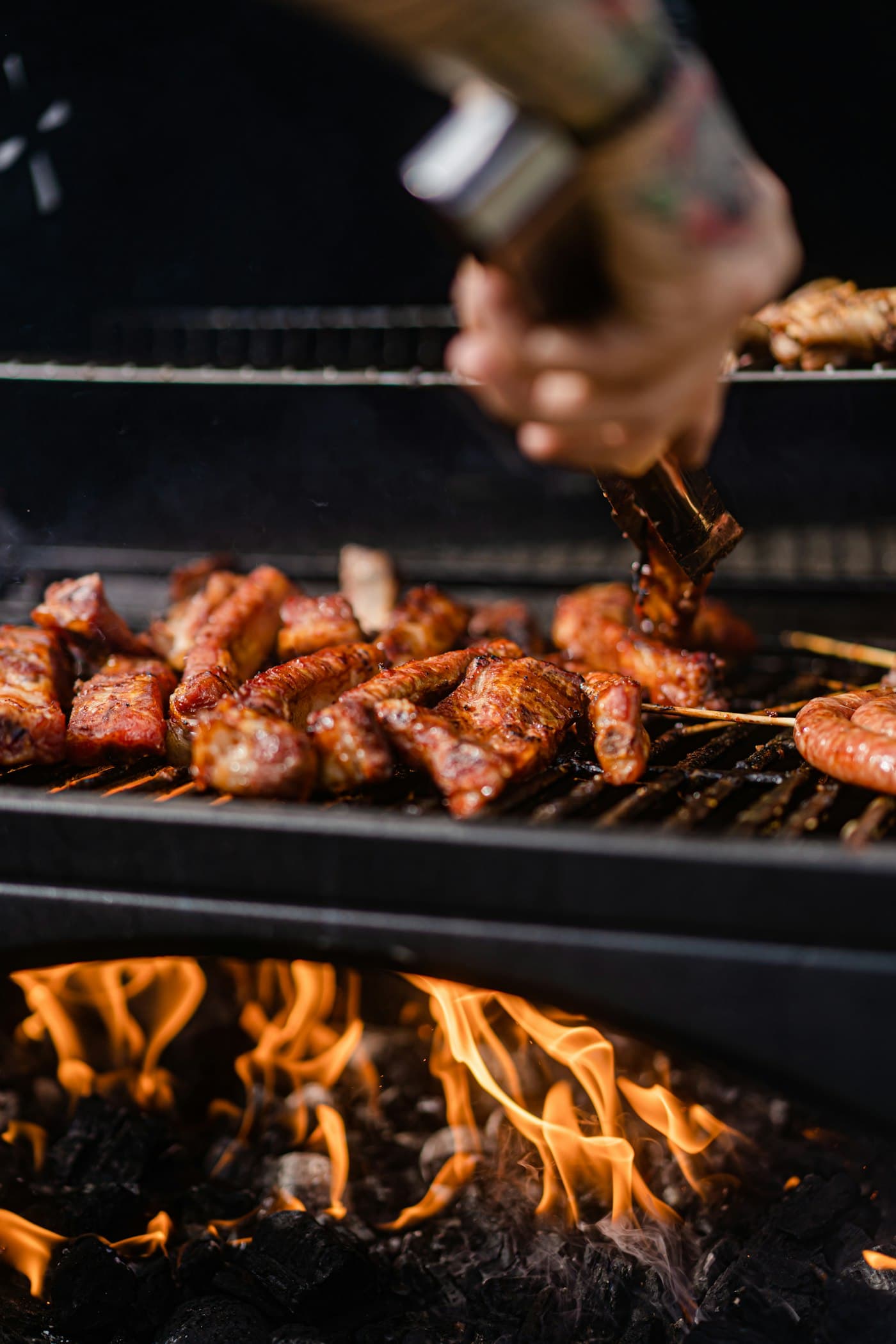 Lamb skewers sizzling over hot charcoal on the street